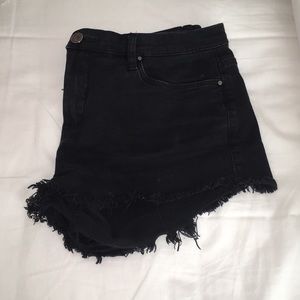BLANKNYC black cut off jean shorts.
